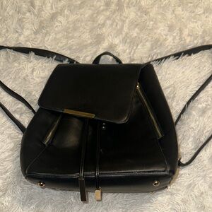 Elegant Black Faux Leather Backpack